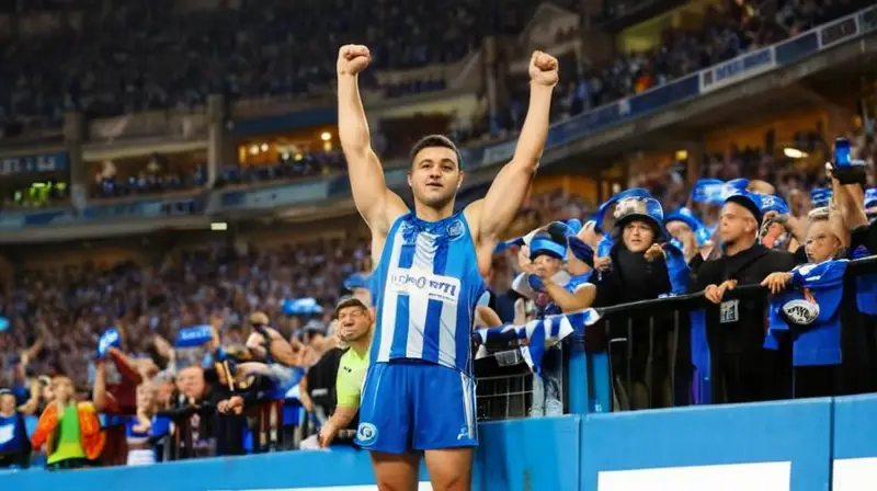 El estadio está repleto de fans con jerseys de Porto, que observan con emoción la victoria del atleta Isaac Nader